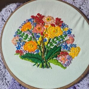 Hand embroidered floral decor